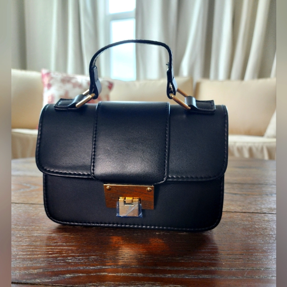 NWOT Petit Black Handbag with detachable Shoulder strap